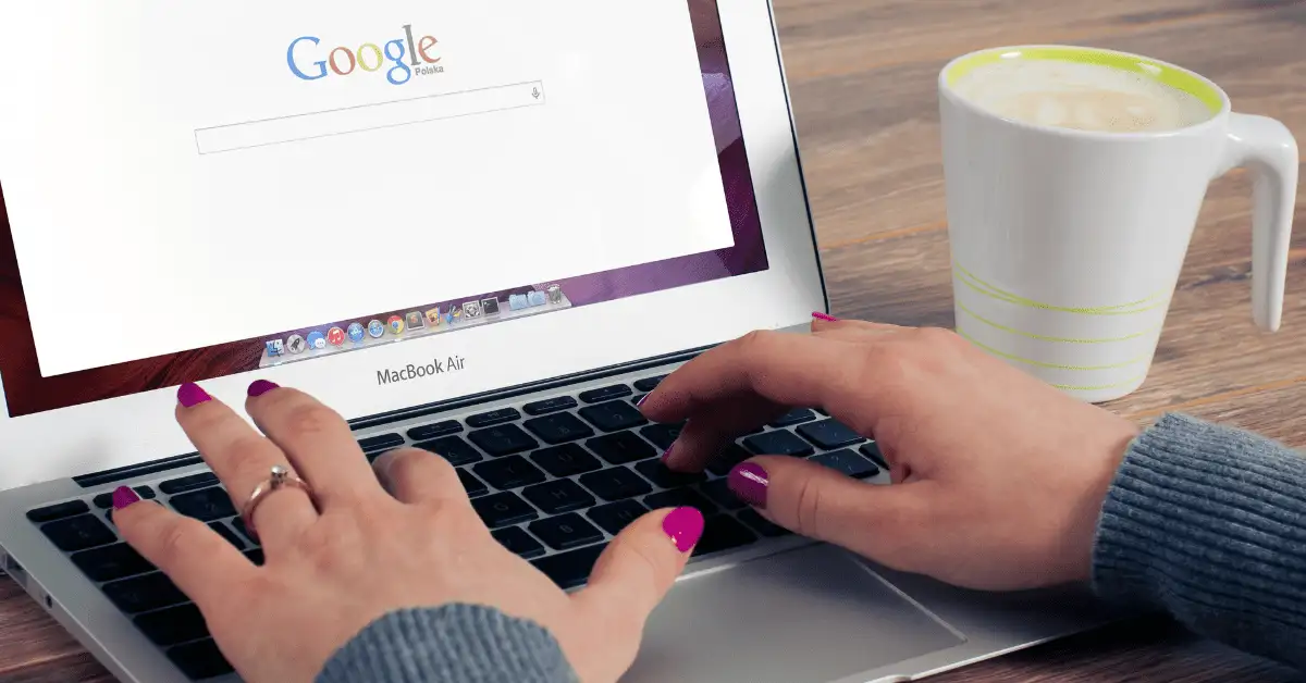 Advanced Google Features for Superior Digital Marketing 2 Laptop open on google with hands typing on the keyboard