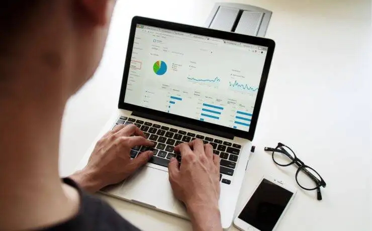 What Is Digital Marketing? 1 Man working on digital marketing analytics