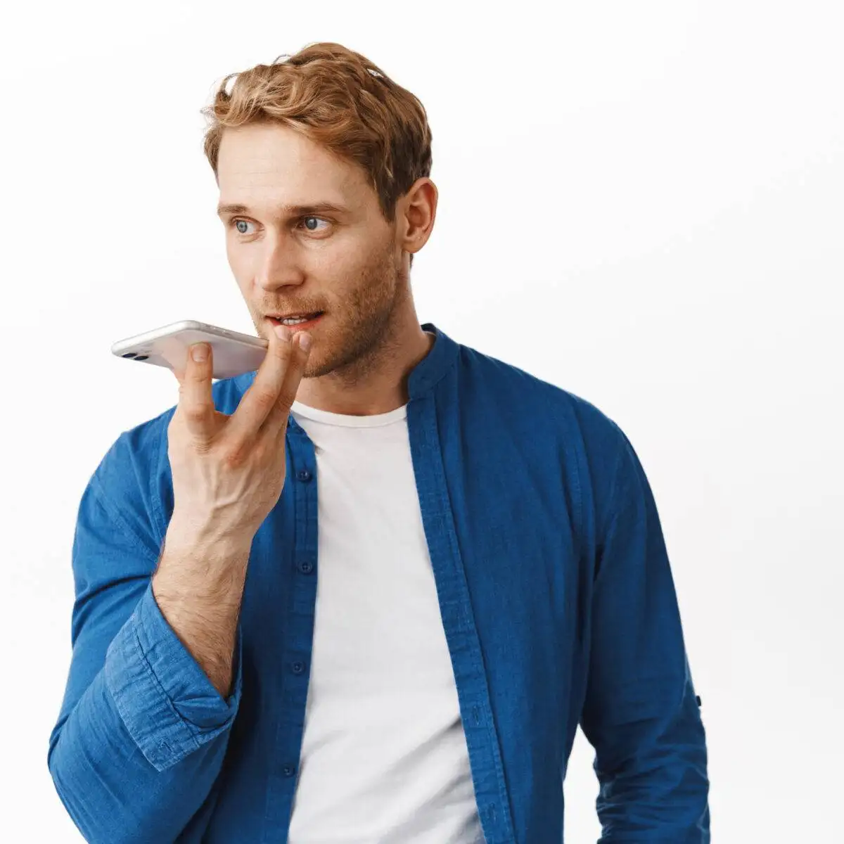 Is My Phone Listening To Me? 2 Man in casual clothing using voice assistance apps on his smartphone