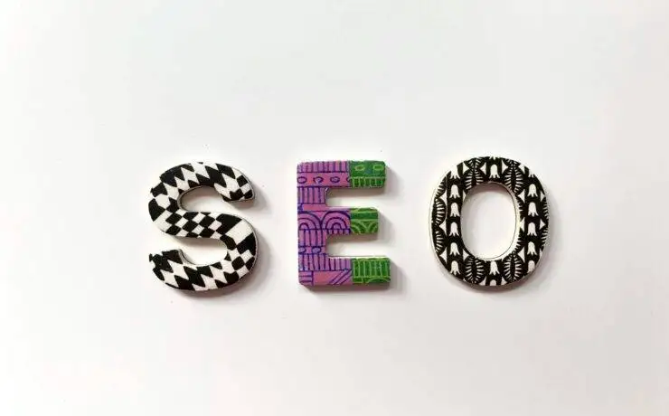 A Step-by-Step Guide on How to Write an SEO-Optimised Blog 1 Decorative letters with patterned designs spelling out SEO on a white background.
