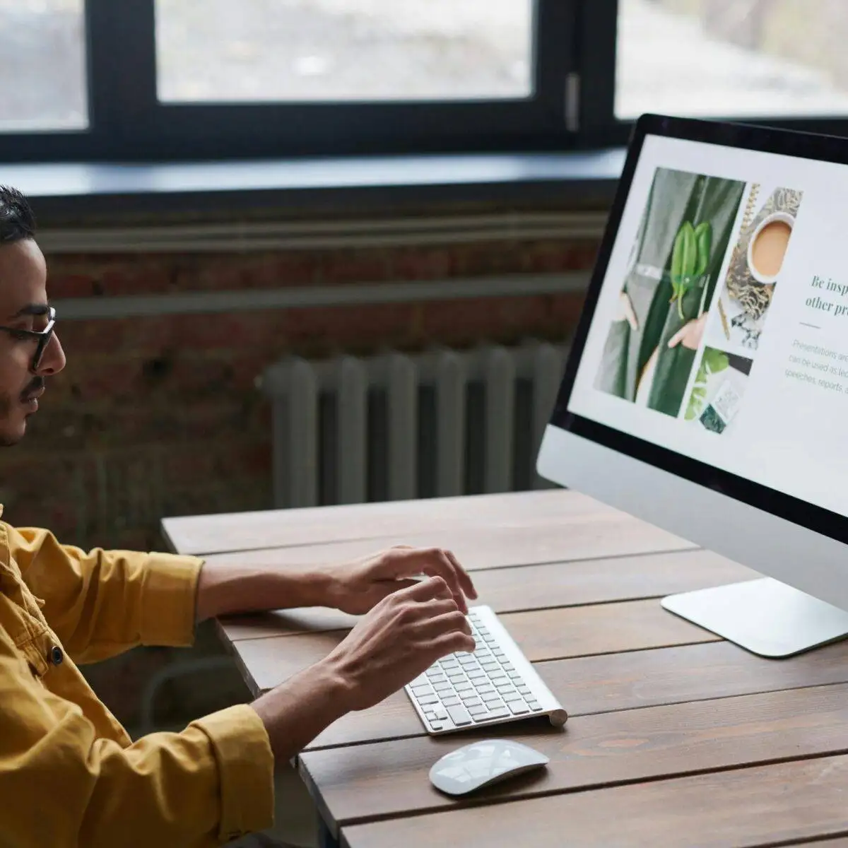 What Is Seo Marketing? - PPC 2 a man sitting at a desk using a computer looking up what an SEO company is
