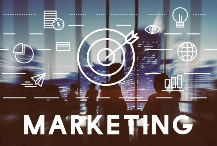 Marketing concept blending traditional and digital marketing strategies with symbols of analytics, target, and global reach.